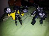 Transformers Sideways vs. Axer Robots In Disguise